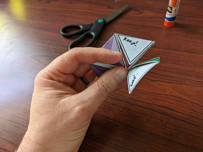 Showing how the glue tabs look after they have been tucked but before they have been glued